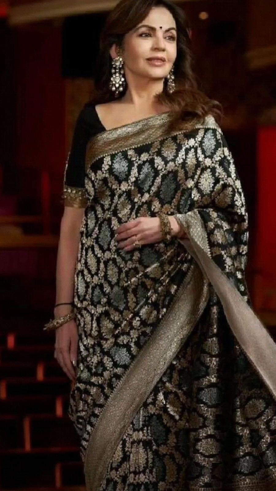 CS11- Nita Ambani black gold saree